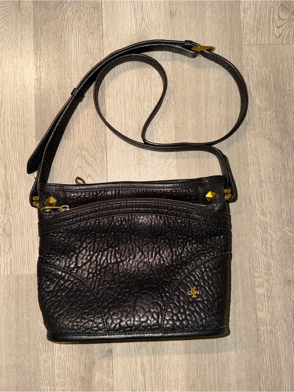 orYANY crossbody bag with gold-tone hardware